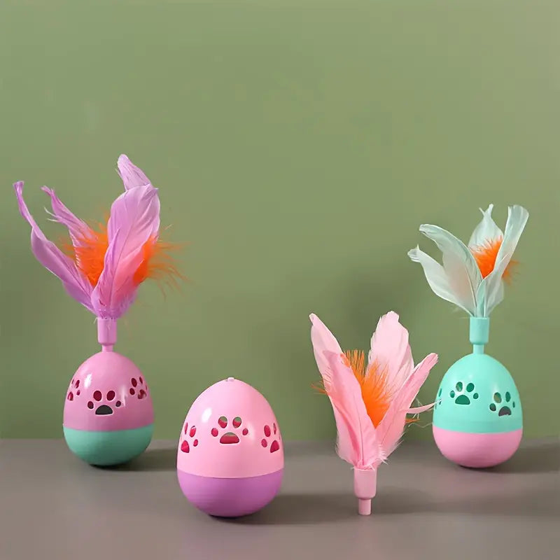 359f409104751803723bce120a3f29f4.jpg Plastic Ball With Feather Cat Toy - Image 1