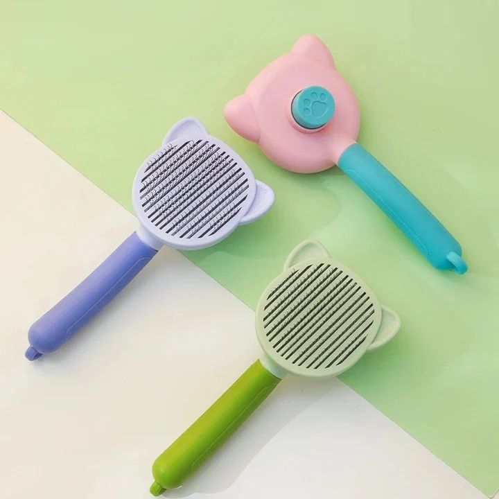 403873911_3685820324981192_5259780876656021134_n.jpg Cat Face Self Cleaning Button Brush For Cats and Dogs - Image 1