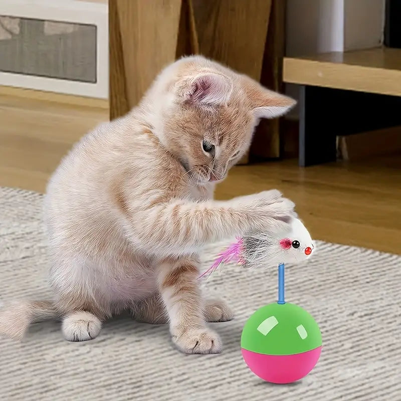 6d02b47422cf6f4f52d6d6688424ab22.jpg Interactive Tumbler Mouse Ball Cat Toy with Feather Tail - Image 1