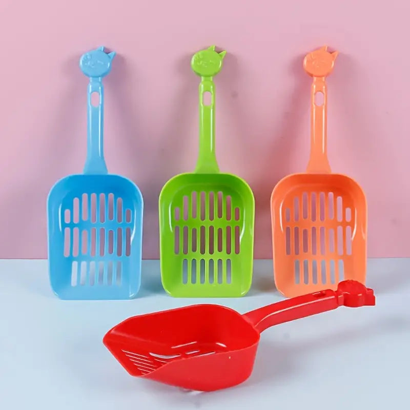 9aac7dc2758b779f052f2079f3d8a16b.jpg Cat Litter Scoop - Image 1